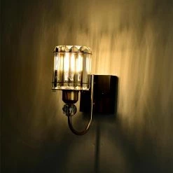 Aitana 5 in. 1-Light Indoor Brass Finish Wall Sconce with Light Kit by Warehouse of Tiffany 18 Aitana 5 in. 1-Light Indoor Brass Finish Wall Sconce with Light Kit by Warehouse of Tiffany -Warehouse of Tiffany Shop brass warehouse of tiffany vanity lighting 3001 1w 44 1000