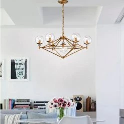 Paulita 30 in. 7-Light Indoor Gold Pendant Light with Light Kit by Warehouse of Tiffany 9 Paulita 30 in. 7-Light Indoor Gold Pendant Light with Light Kit by Warehouse of Tiffany -Warehouse of Tiffany Shop gold warehouse of tiffany chandeliers hm222 7mg 31 1000