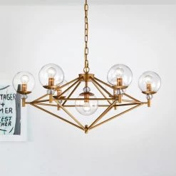 Paulita 30 in. 7-Light Indoor Gold Pendant Light with Light Kit by Warehouse of Tiffany 7 Paulita 30 in. 7-Light Indoor Gold Pendant Light with Light Kit by Warehouse of Tiffany -Warehouse of Tiffany Shop gold warehouse of tiffany chandeliers hm222 7mg c3 1000