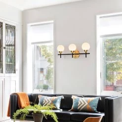 Aeneas 17 in. 3-Light Indoor Matte Black and Brass Wall Sconce with Light Kit by Warehouse of Tiffany -Warehouse of Tiffany Shop matte black and brass warehouse of tiffany vanity lighting 3003 3w 31 1000